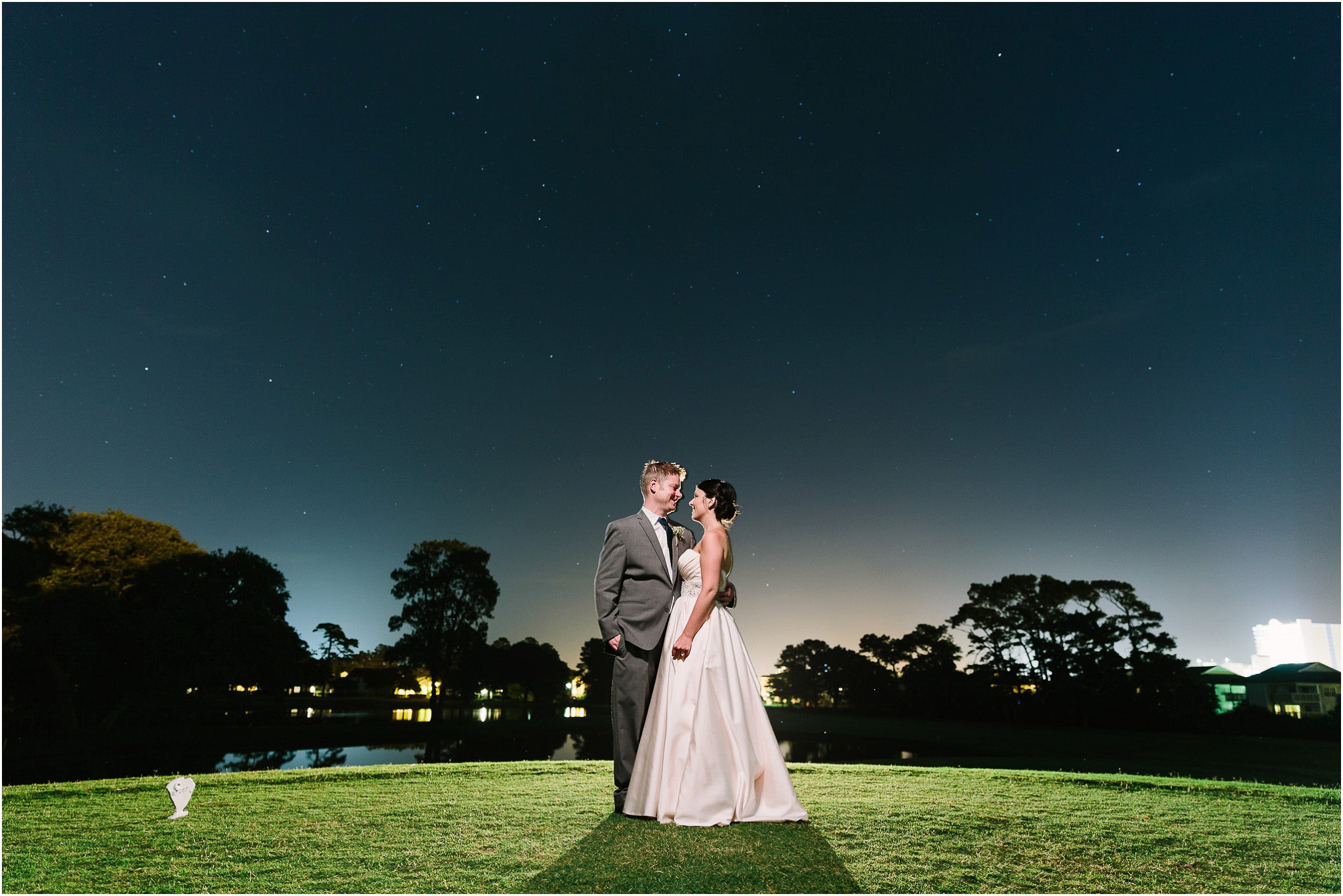 The couple standing under what will soon be a gorgeous starry night sky - Myrtle Beach wedding of Meg and Matt at the Golf Beach and Surf club-38