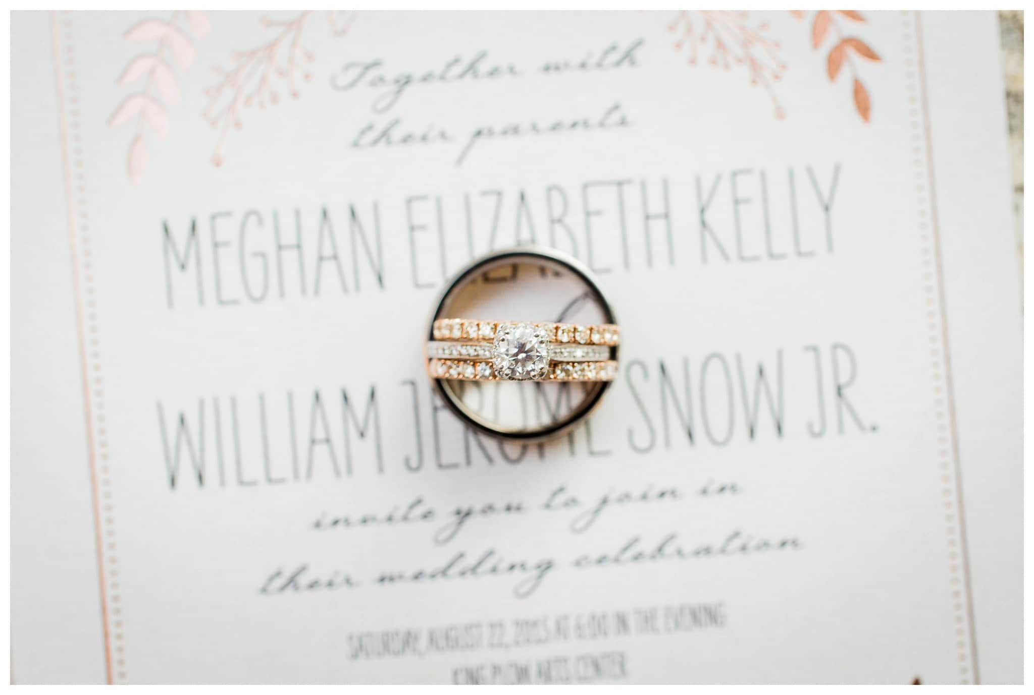 A Gorgeous Ring - The Brides Rings positioned on an invite - Venue and Catering – King plow Event Gallery and Bold American Events Decor and flowers – Stylish Stems Music and Band – Seven Sharp Nine Transportation – Georgia Trolley Photographer One Life Photography