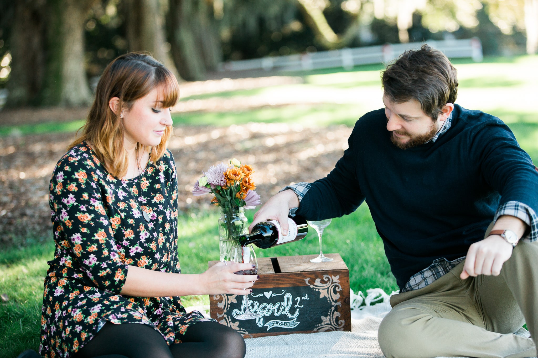 Brian and Kelsey sharing a picnic style bottle of wine, Caledonia Golf and Fish Club, Myrtle Beach Engagement Session 4, www.onelifephoto.net