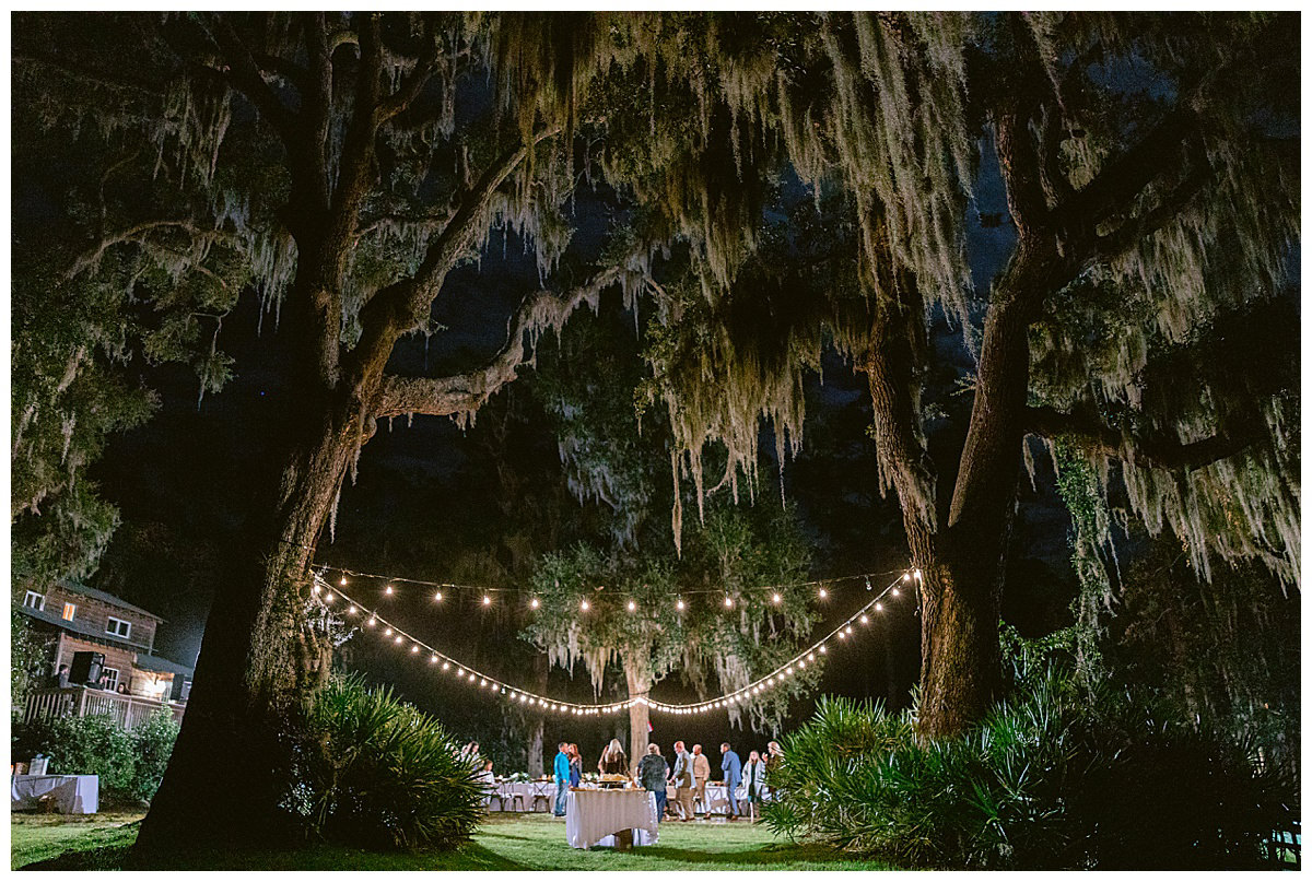 Night view of the reception under the live oaks