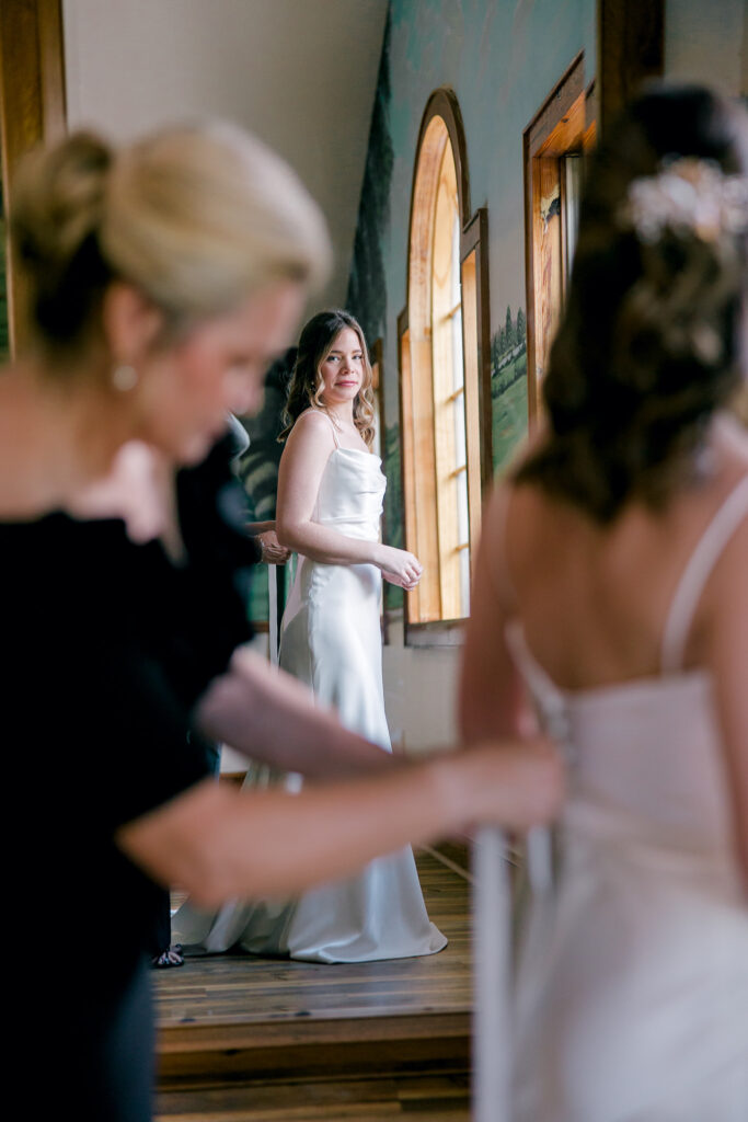 Reflection of the bride in the mirror